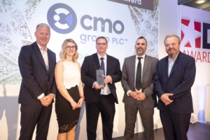 Abby Weeks, Martin Winterburn and Ben Hodson from CMO Group PLC receiving the DIY Week Award 2022 for Business Expansion of the Year